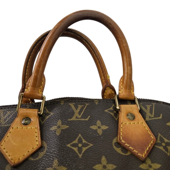 Louis Vuitton Alma PM Handbag in Monogram Canvas and Leather in Brown - Picture 12 of 15